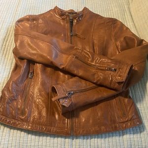 Black Rivet genuine leather bomber jacket.